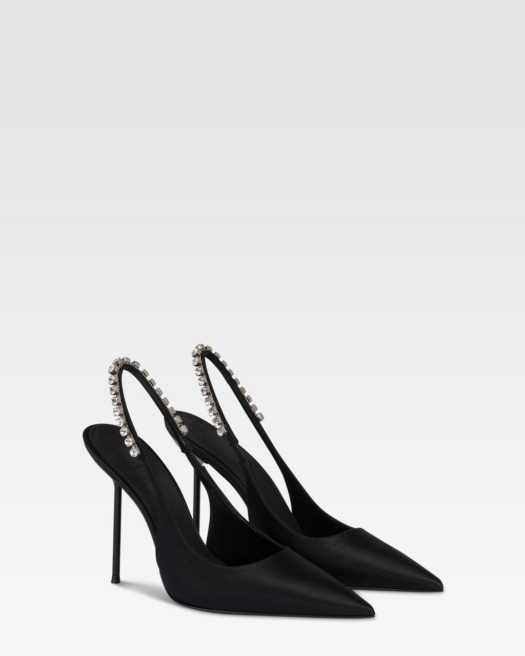 Slingbacks in black satin with stud detailing.