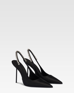 Slingbacks in black satin with stud detailing.
