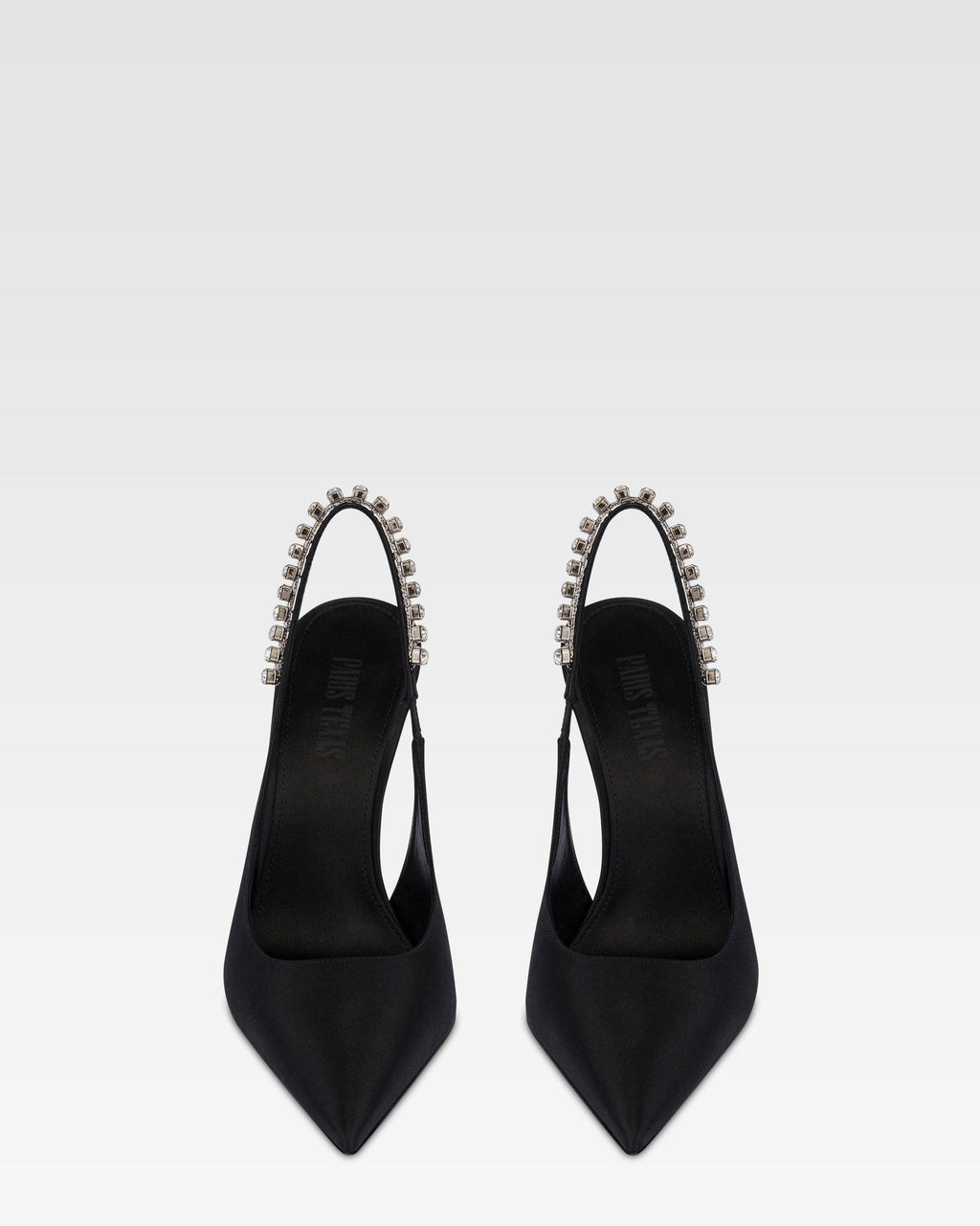 Slingbacks in black satin with stud detailing.