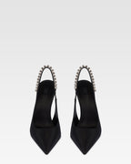 Slingbacks in black satin with stud detailing.