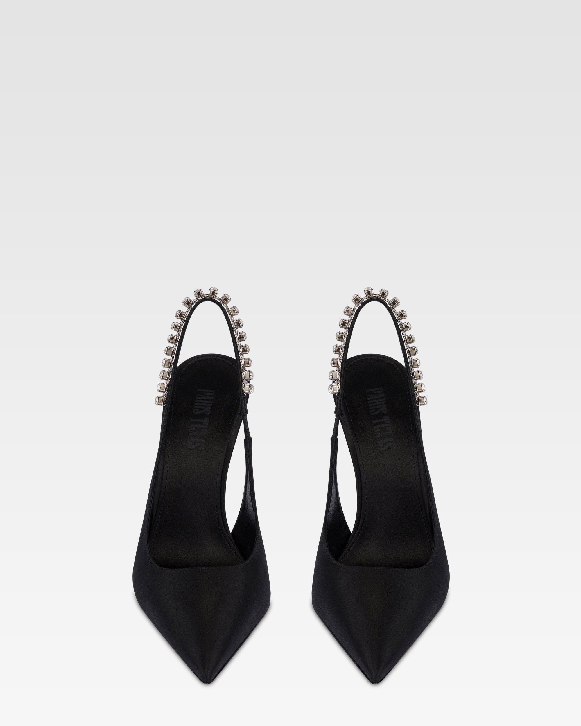 Slingbacks in black satin with stud detailing.