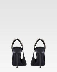 Slingbacks in black satin with stud detailing.