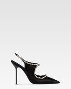 Slingbacks in black satin with stud detailing.