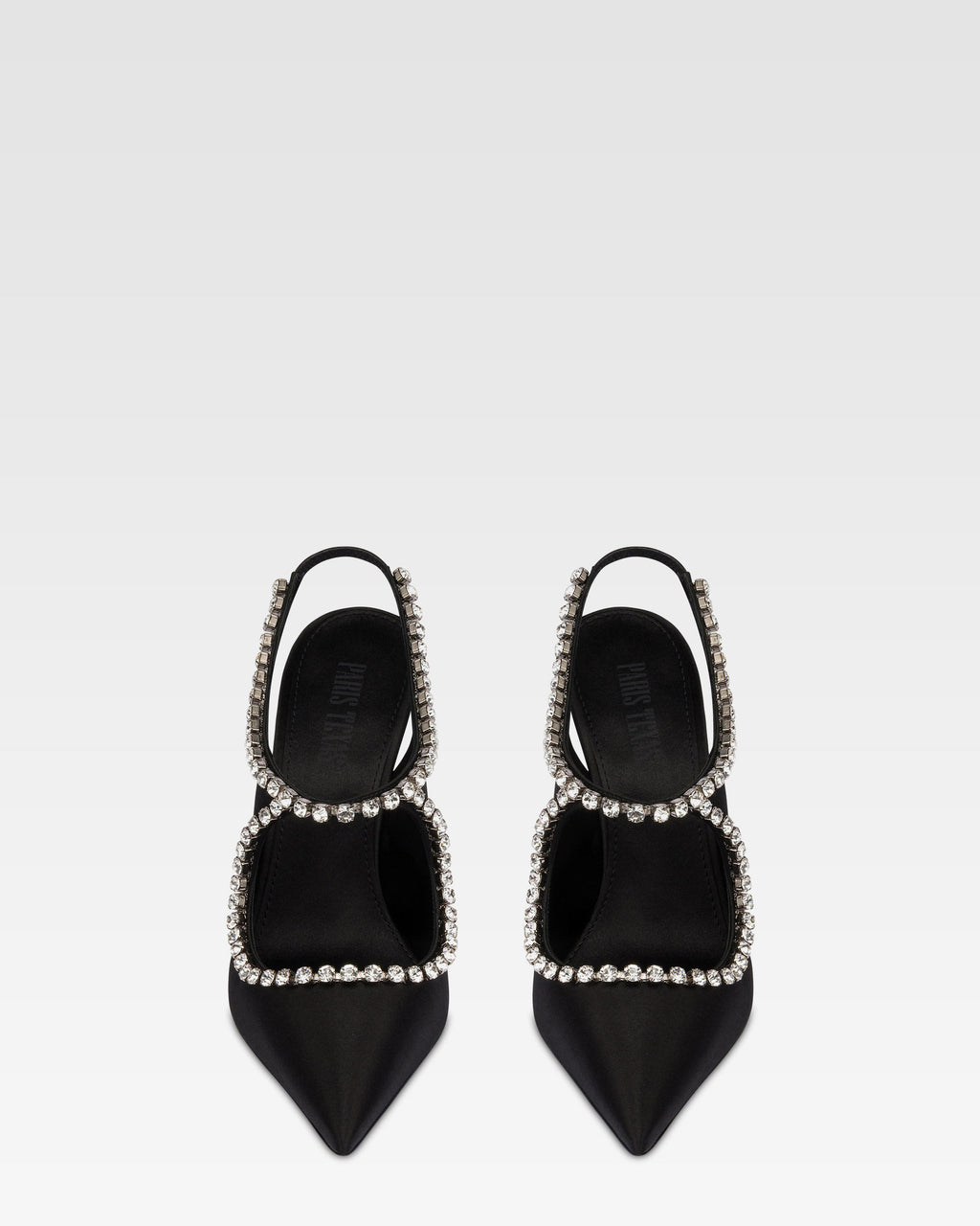 Slingbacks in black satin with stud detailing.
