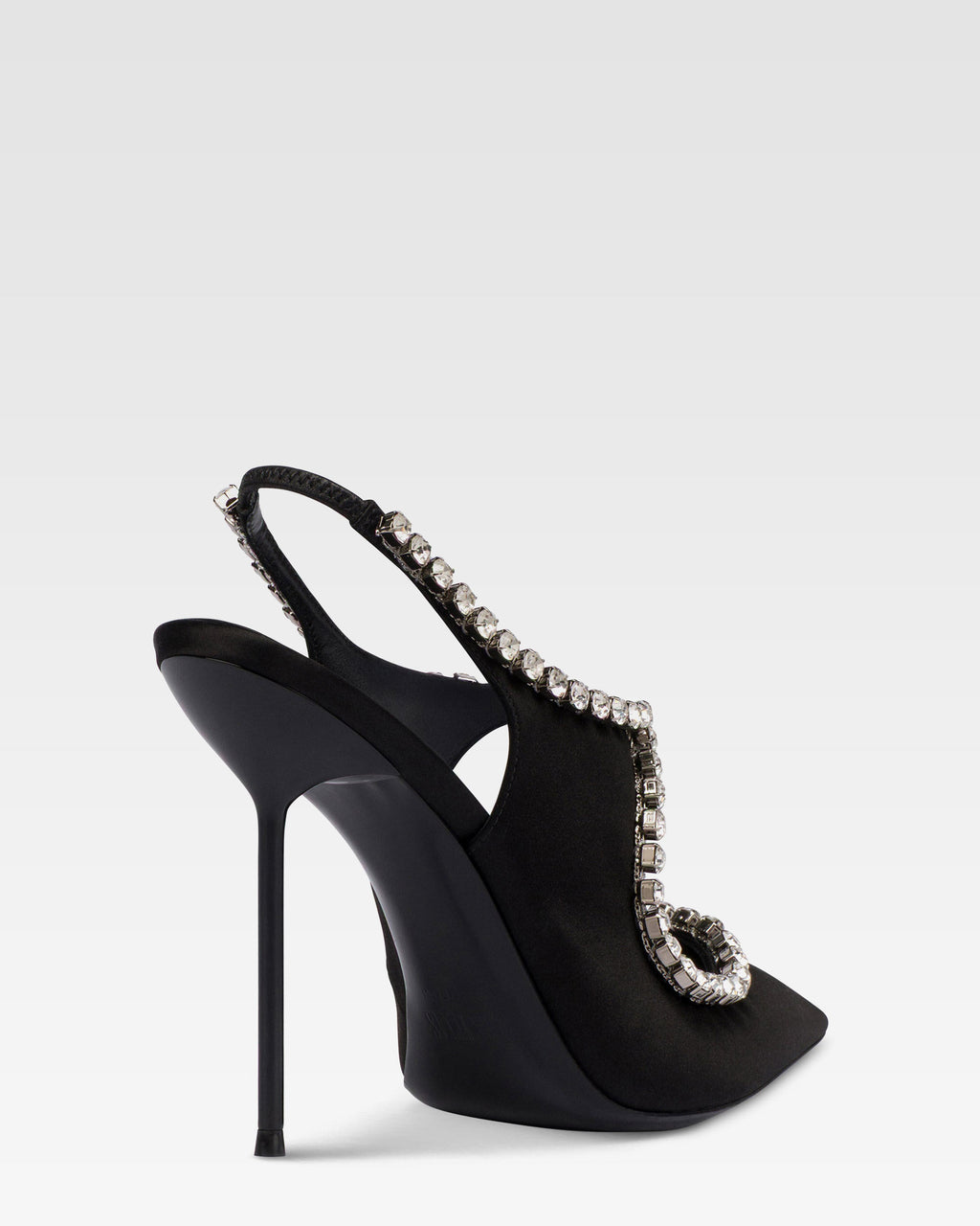 Slingbacks in black satin with stud detailing.