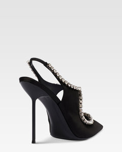Slingbacks in black satin with stud detailing.