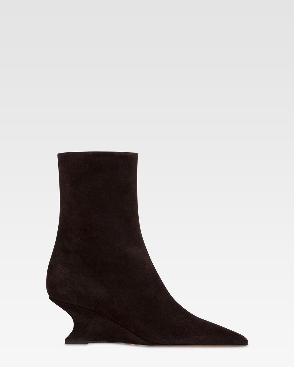 Ankle boots in ebony calf suede leather.