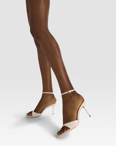 Ankle-strap sandals in ivory patent leather