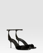 Ankle-strap sandals in black patent leather