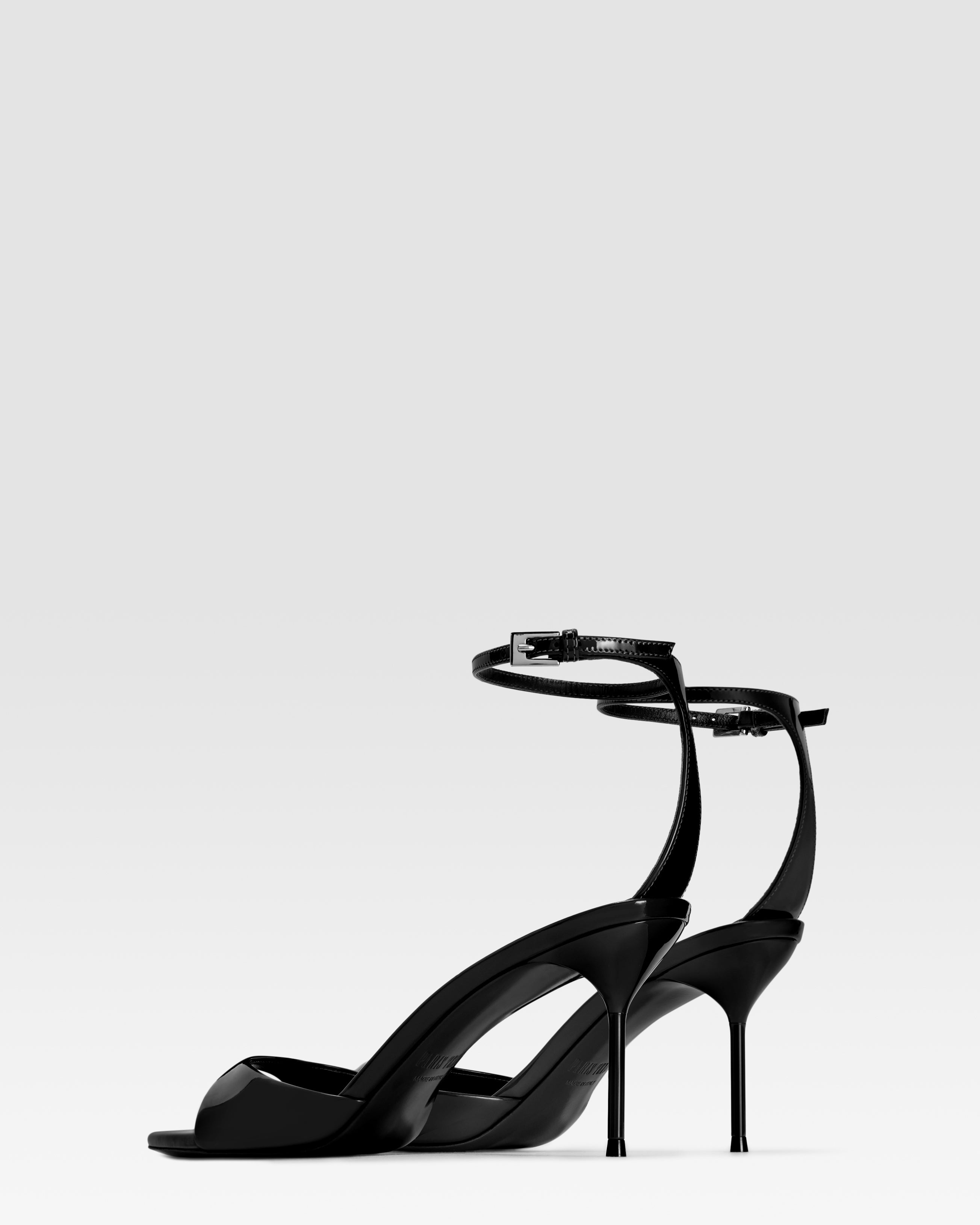 Ankle-strap sandals in black patent leather
