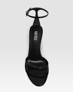 Ankle-strap sandals in black patent leather