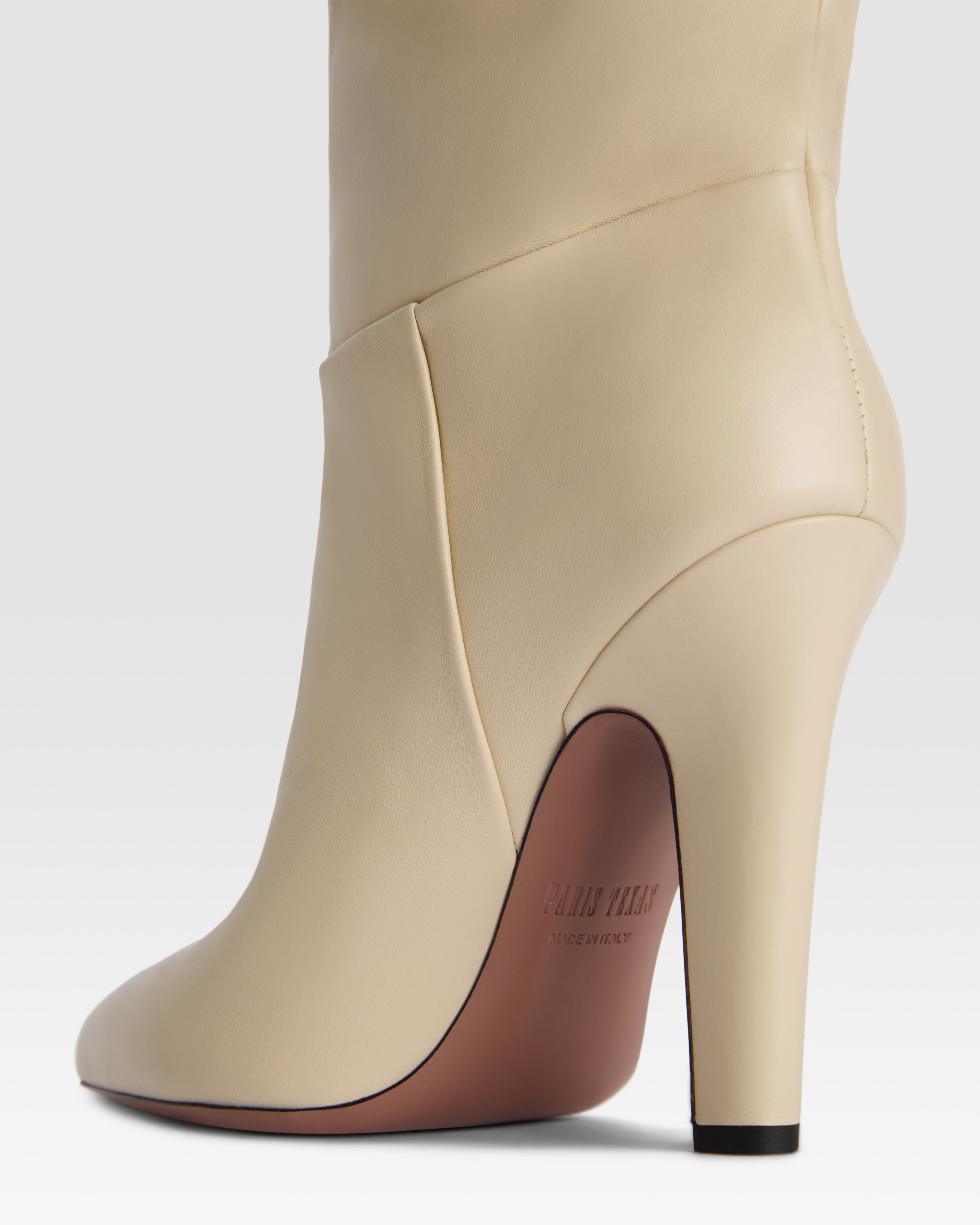 Botas de piel de color hueso