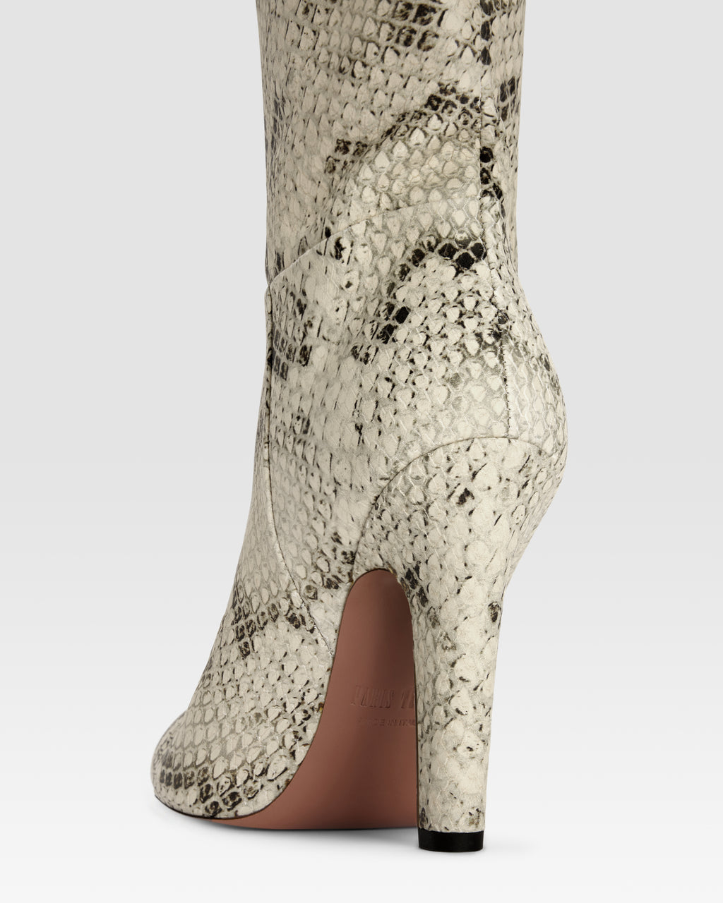 Boots in sand printed python leather