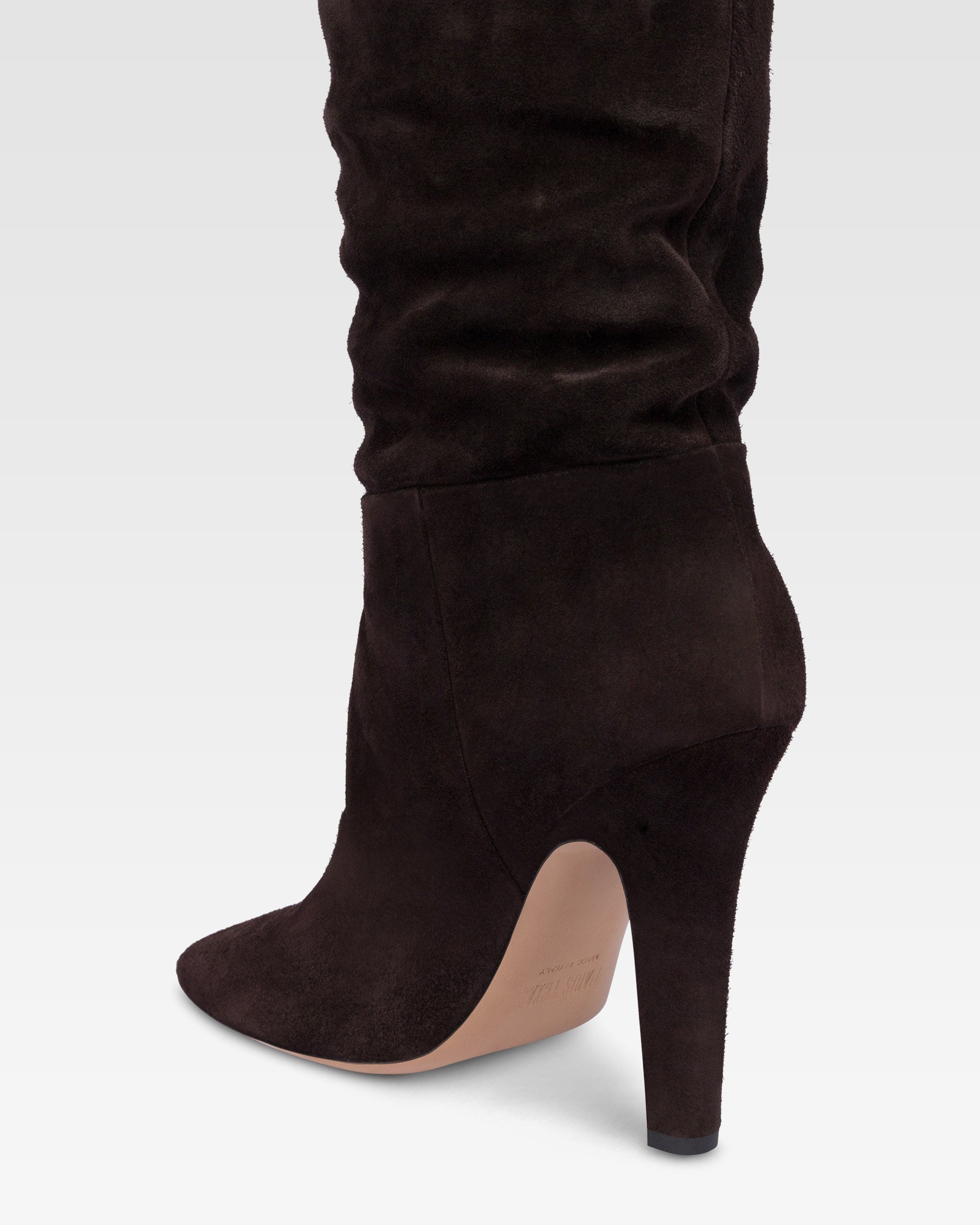 Boots in ebony calf suede leather.