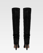 Boots in black calf suede leather.