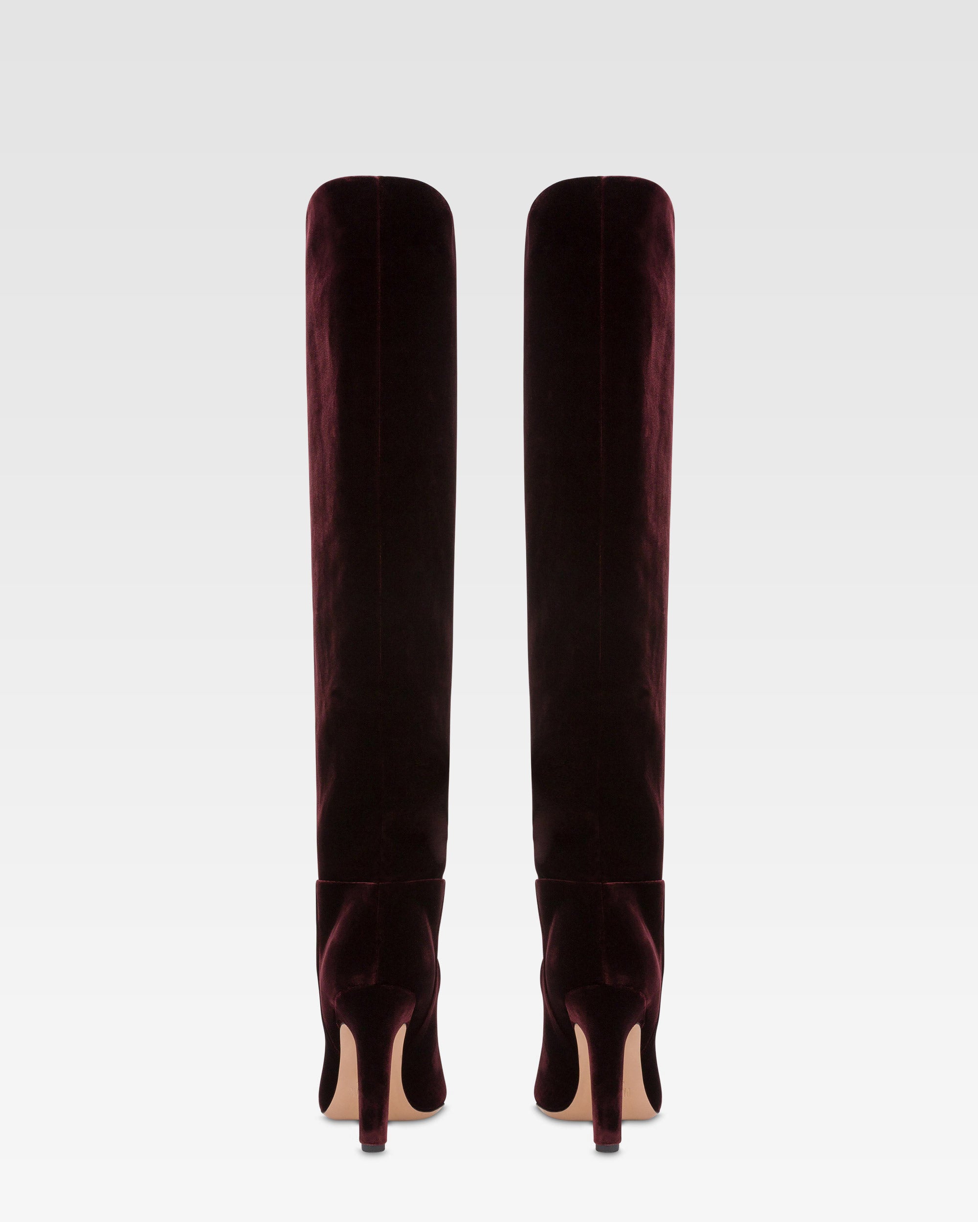 Boots in pinot noir velvet.