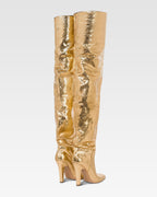Over-the-knee boots in gold, metallic-effect printed python leather.