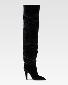 Over-the-knee boots in black velvet.