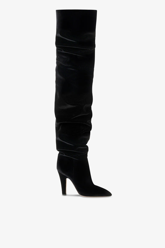 Over-the-knee boots in black velvet.