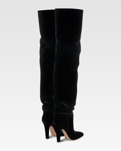 Over-the-knee boots in black velvet.
