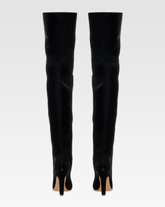 Over-the-knee boots in black velvet.