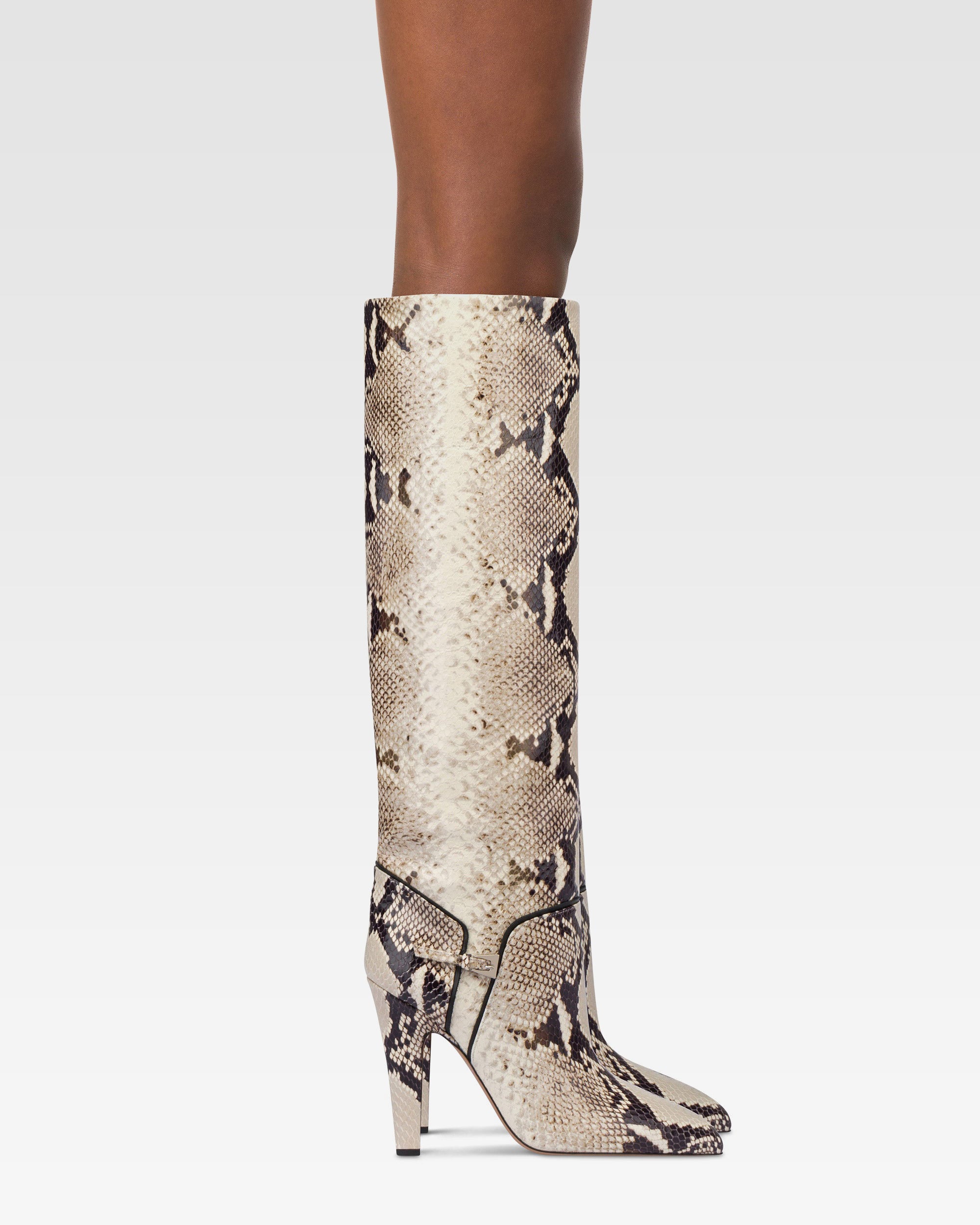 Boots in natural printed python leather.