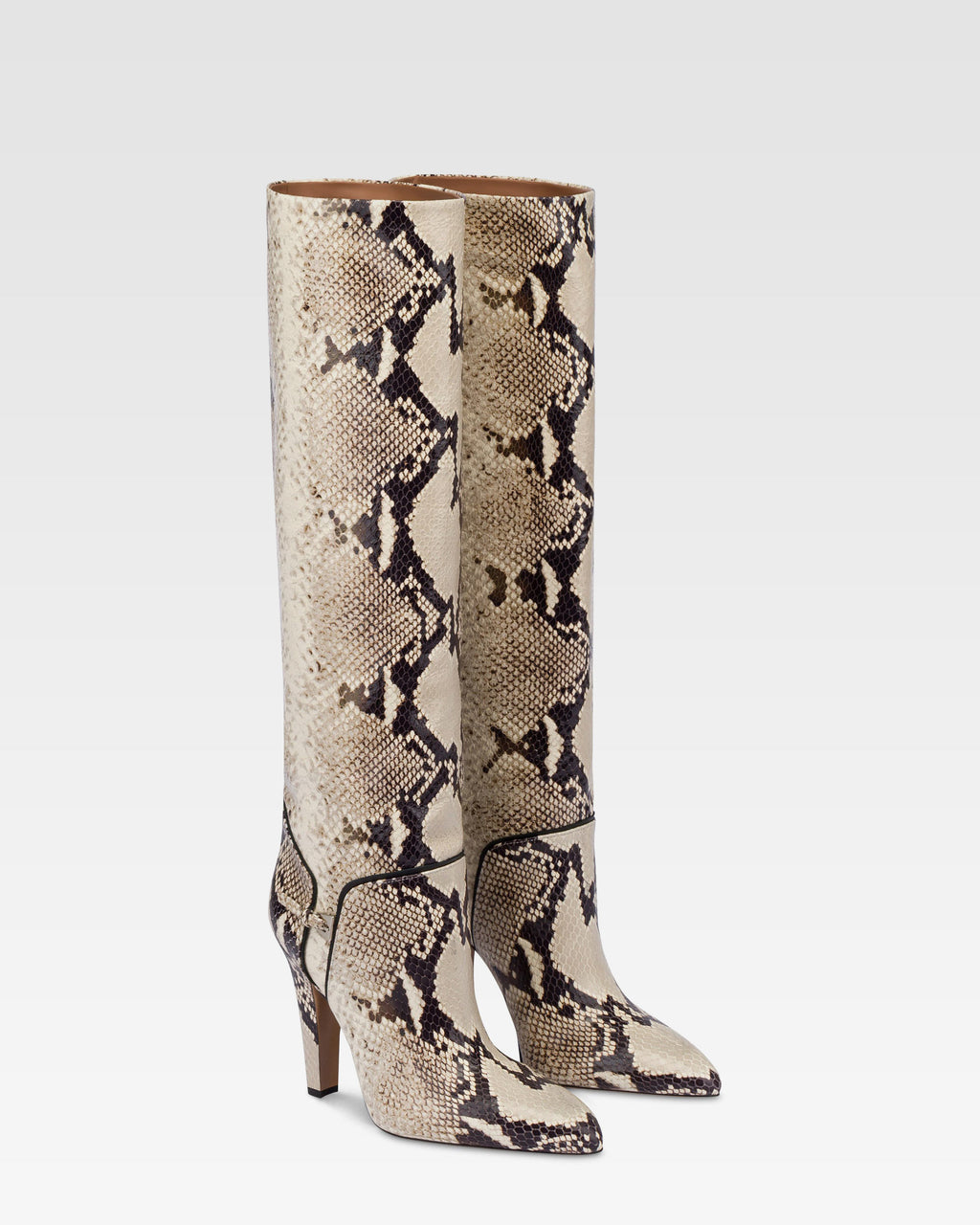 Boots in natural printed python leather.