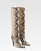 Boots in natural printed python leather.