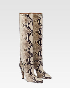 Boots in natural printed python leather.