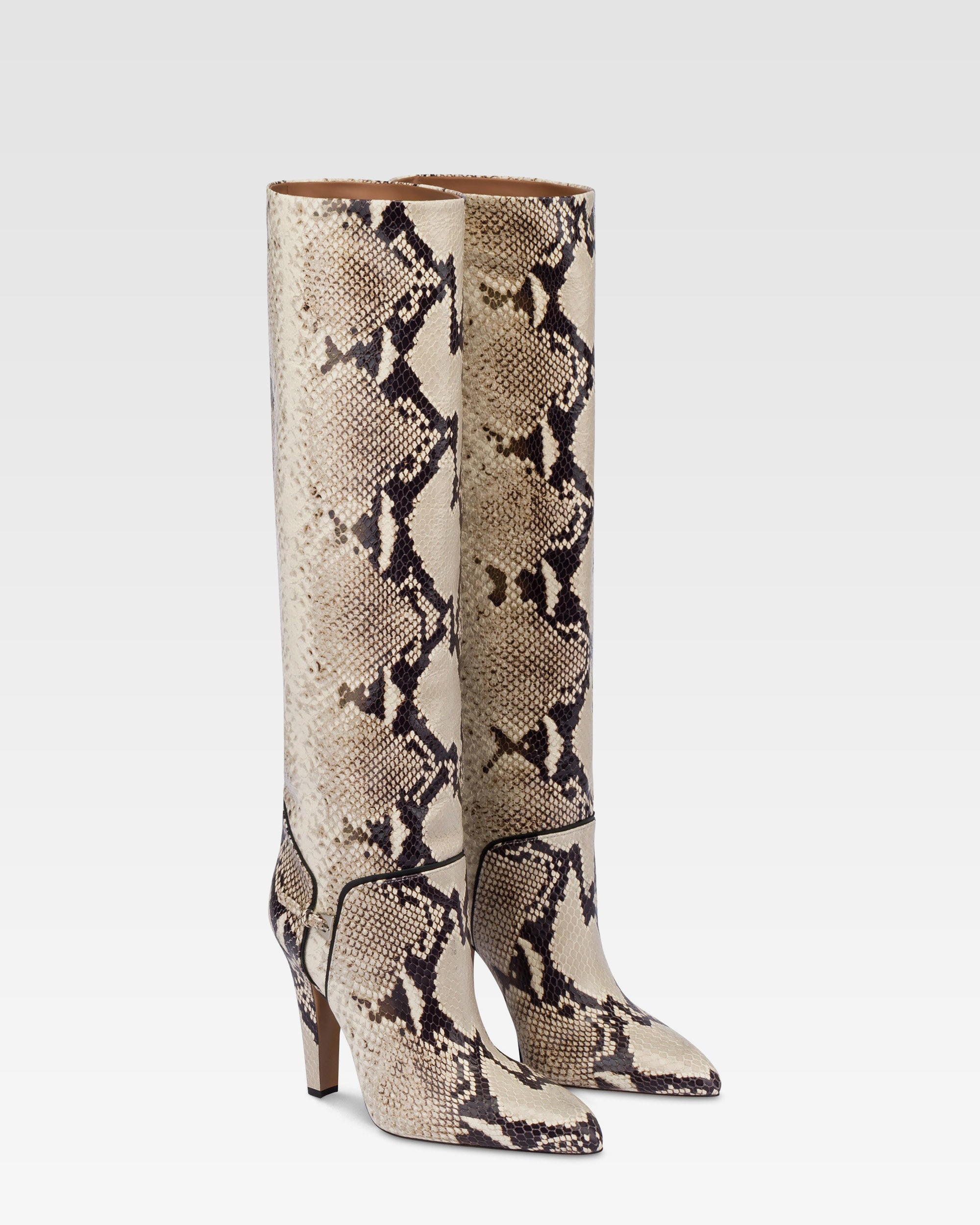 Boots in natural printed python leather.