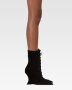 Ankle boots in black calf suede leather.