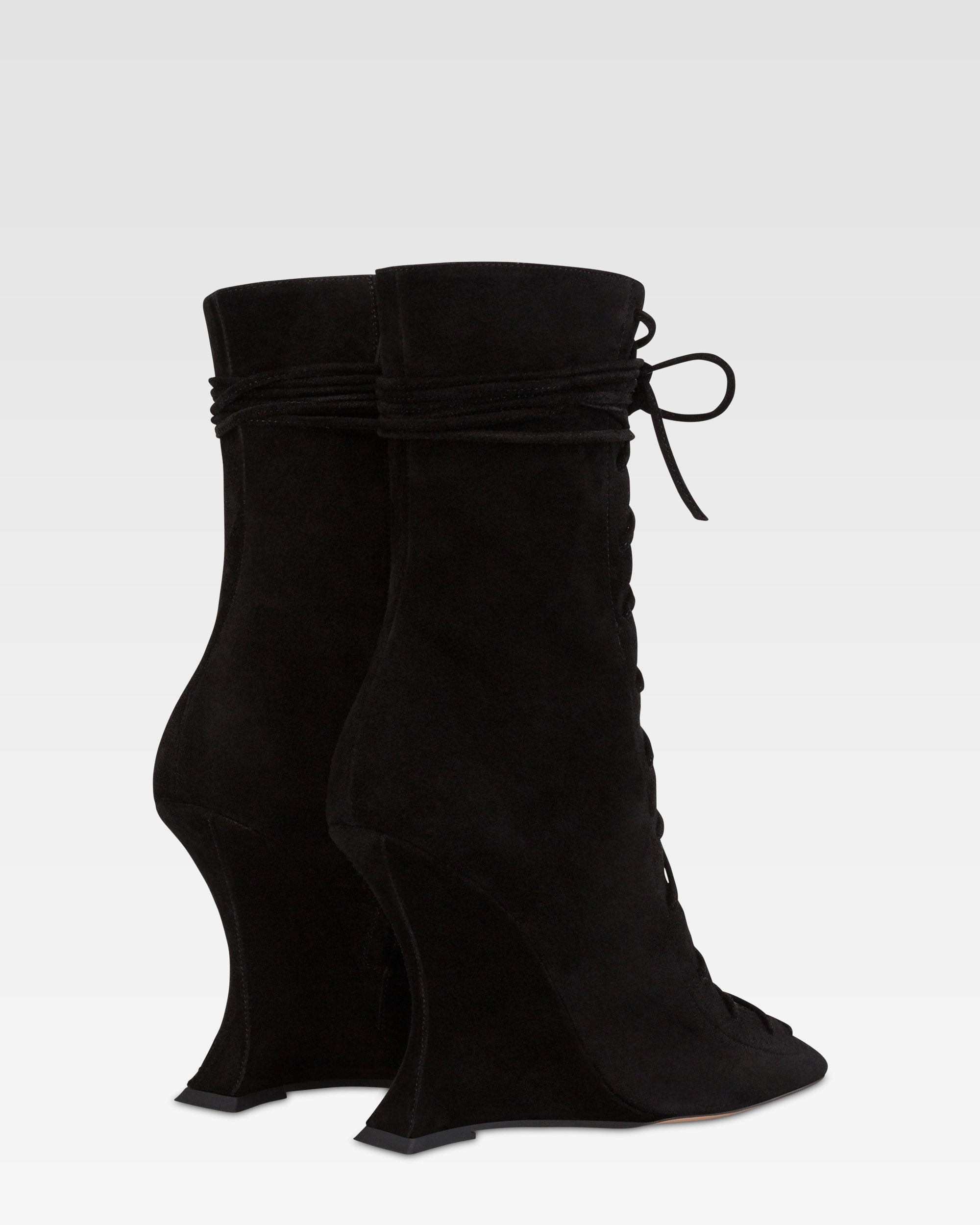 Ankle boots in black calf suede leather.