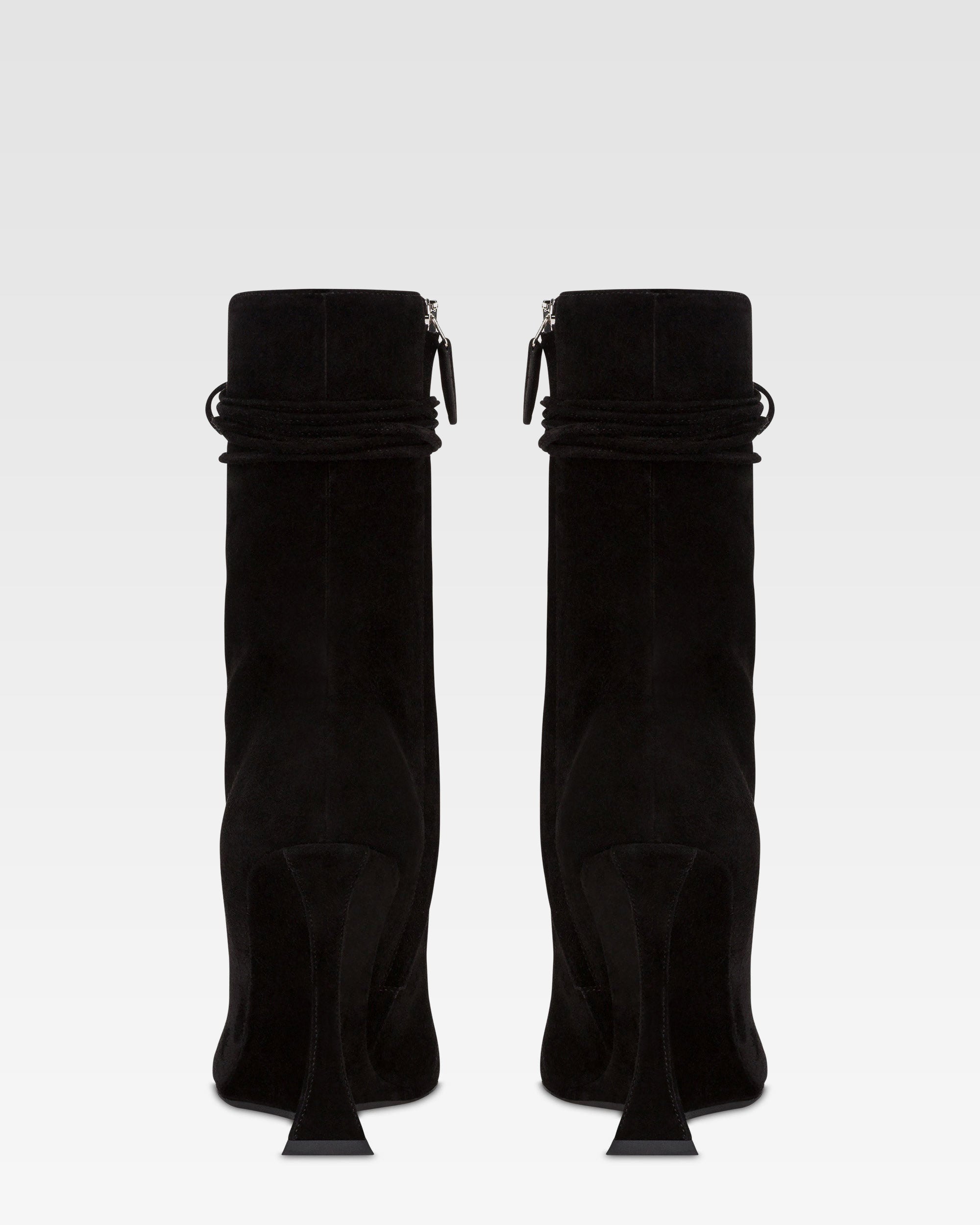 Ankle boots in black calf suede leather.