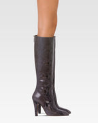 Boots in ash printed python leather.