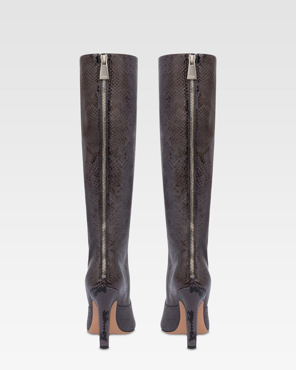 Boots in ash printed python leather.