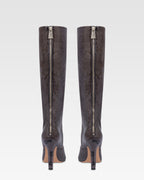 Boots in ash printed python leather.