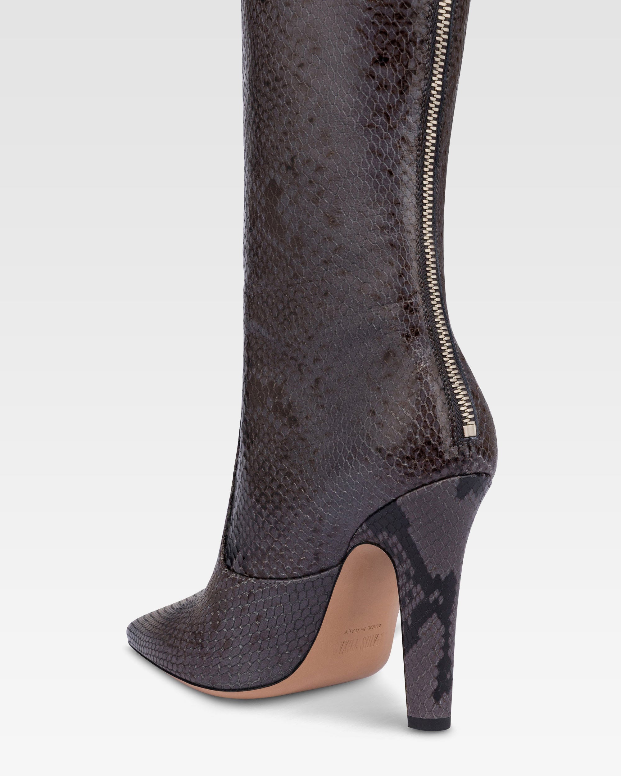 Boots in ash printed python leather.