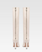 Boots in vanilla calf leather.