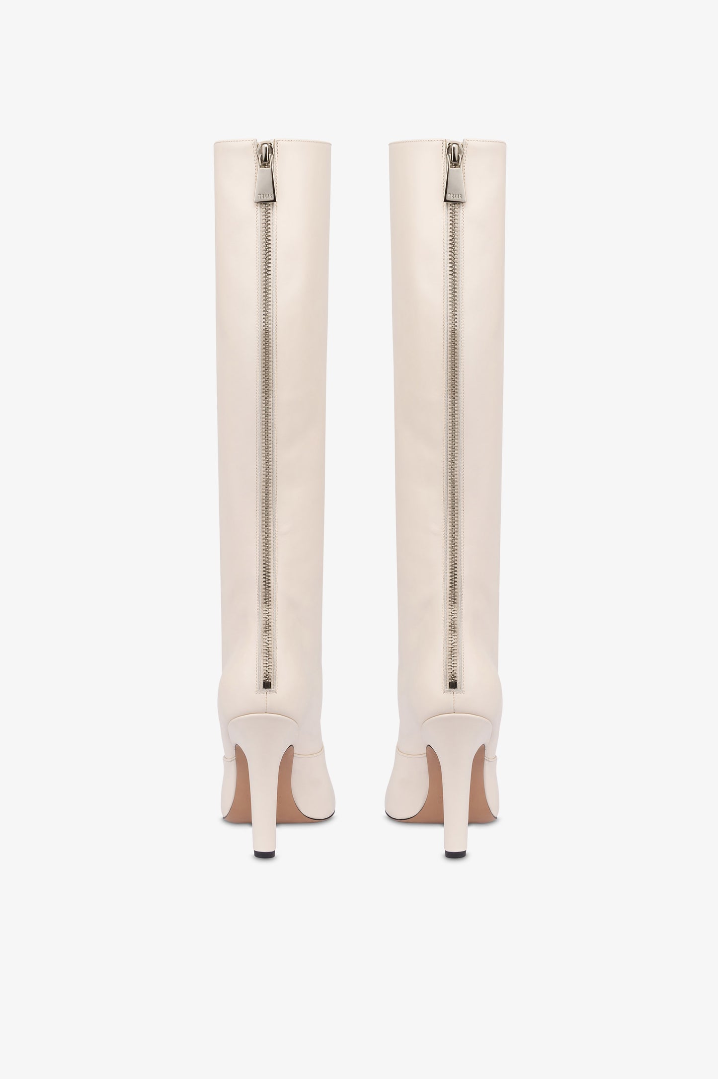 Boots in vanilla calf leather.