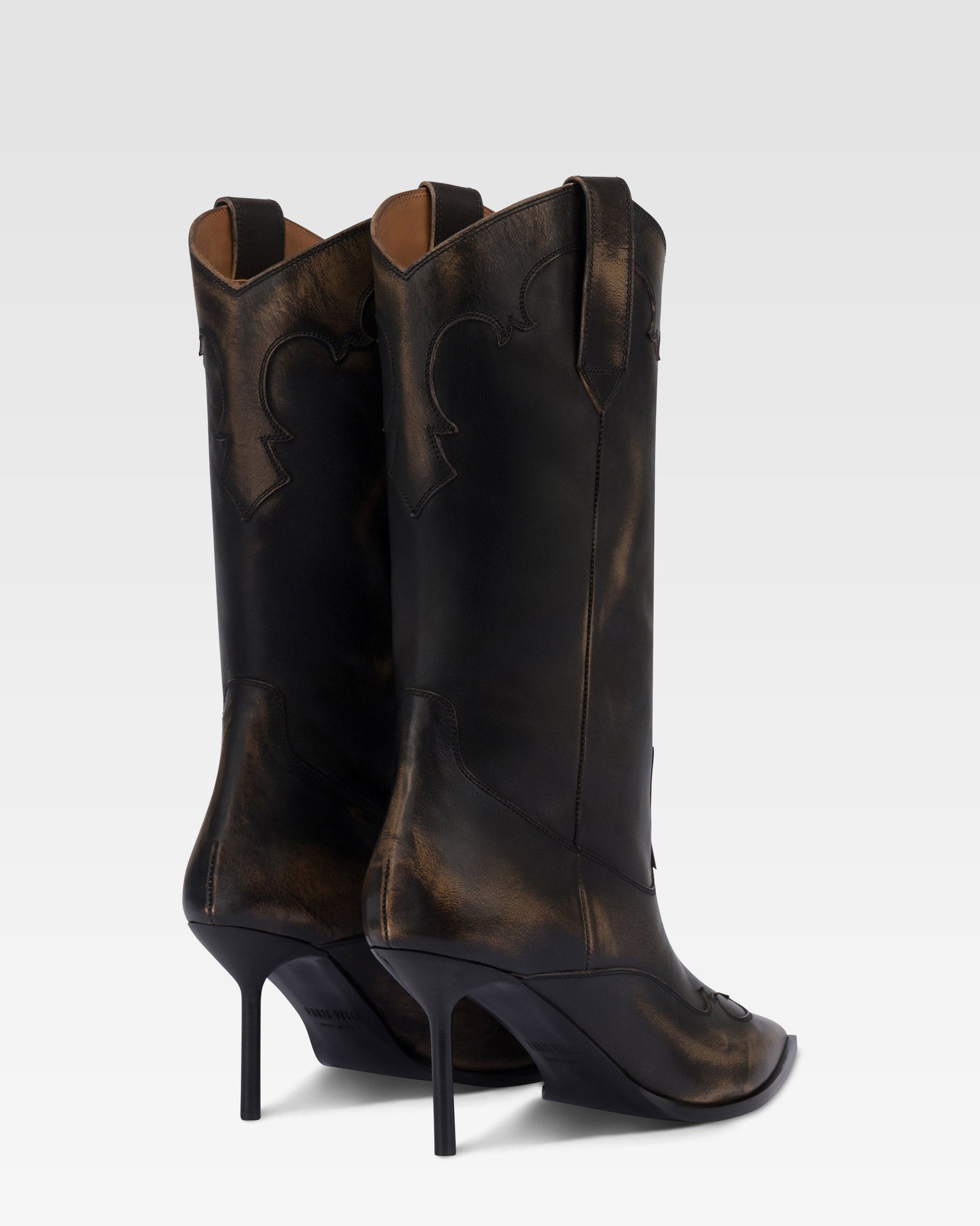 Boots in black brushed leather.