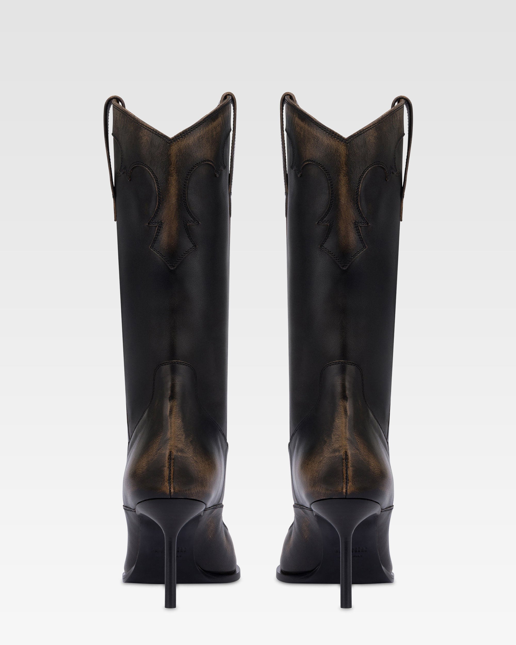 Boots in black brushed leather.