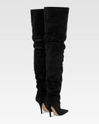 Over-the-knee boots in black suede leather.
