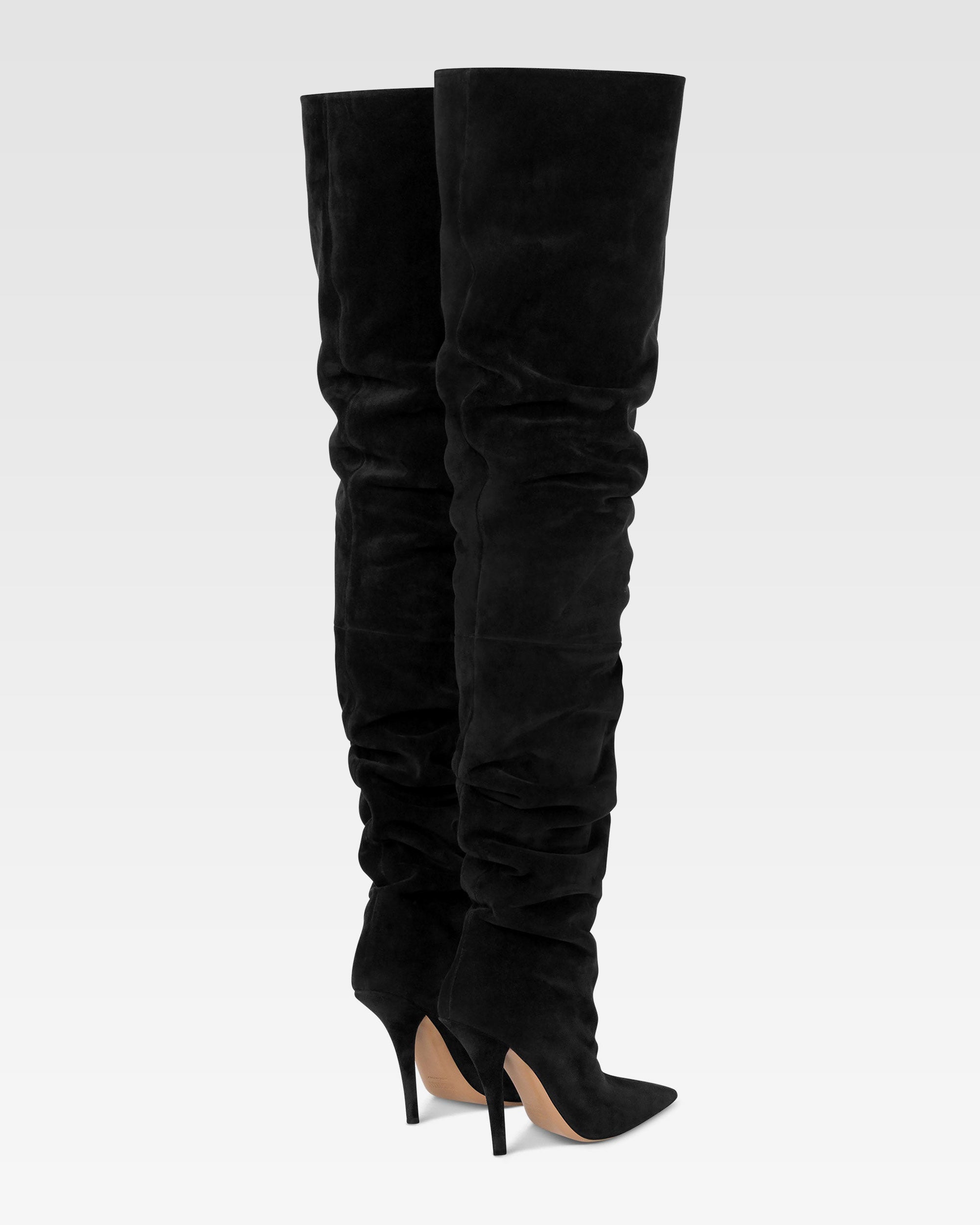 Over-the-knee boots in black suede leather.