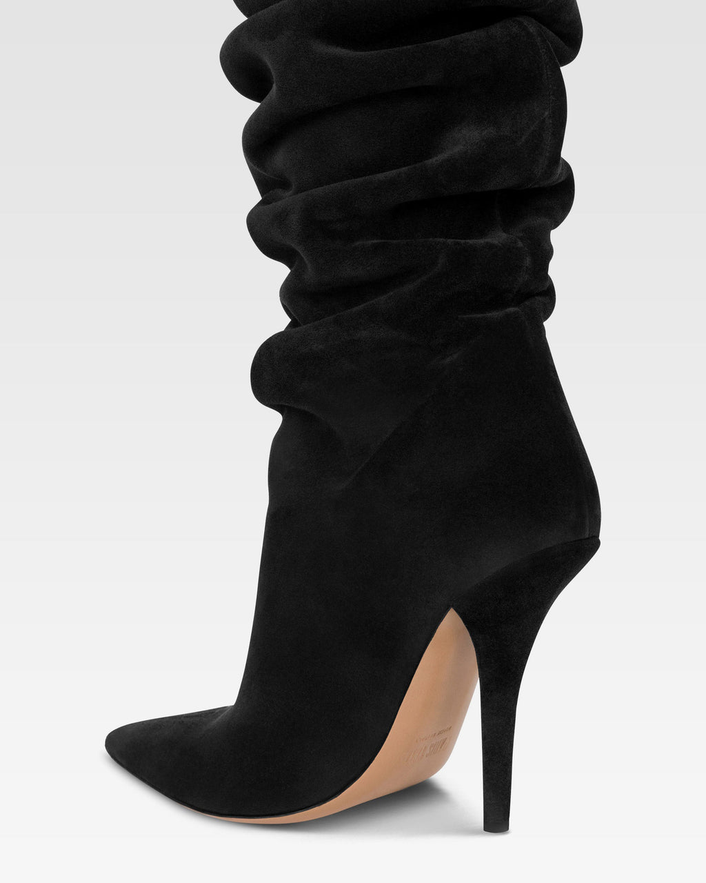 Over-the-knee boots in black suede leather.