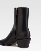 Ankle boots in black calf leather.