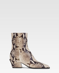 Ankle boots in natural printed python leather. — Natural