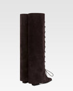 Fold-over boots in ebony calf suede.