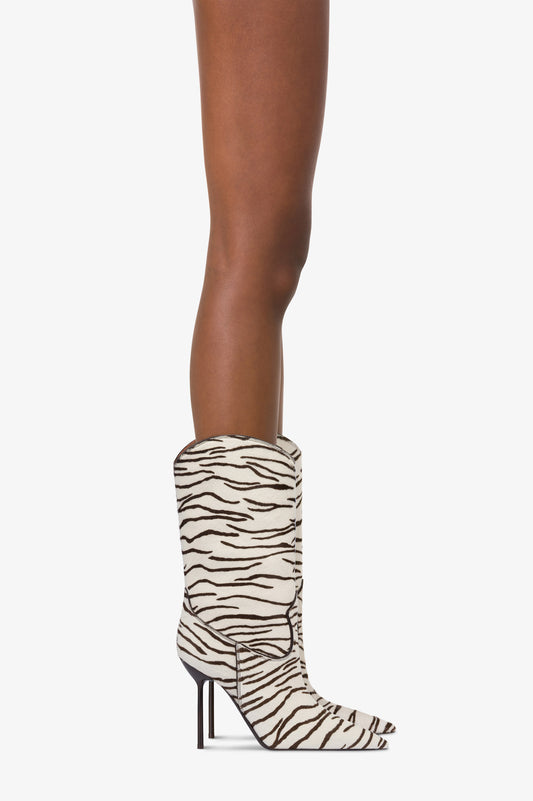 Botas con estampado de piel de vaca en blanco y ebano.