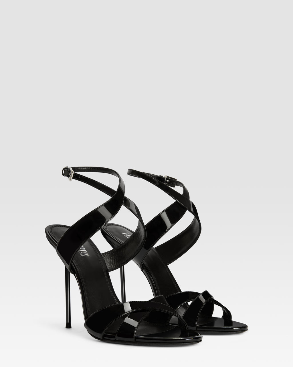 Sandals in black patent leather