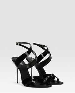 Sandals in black patent leather